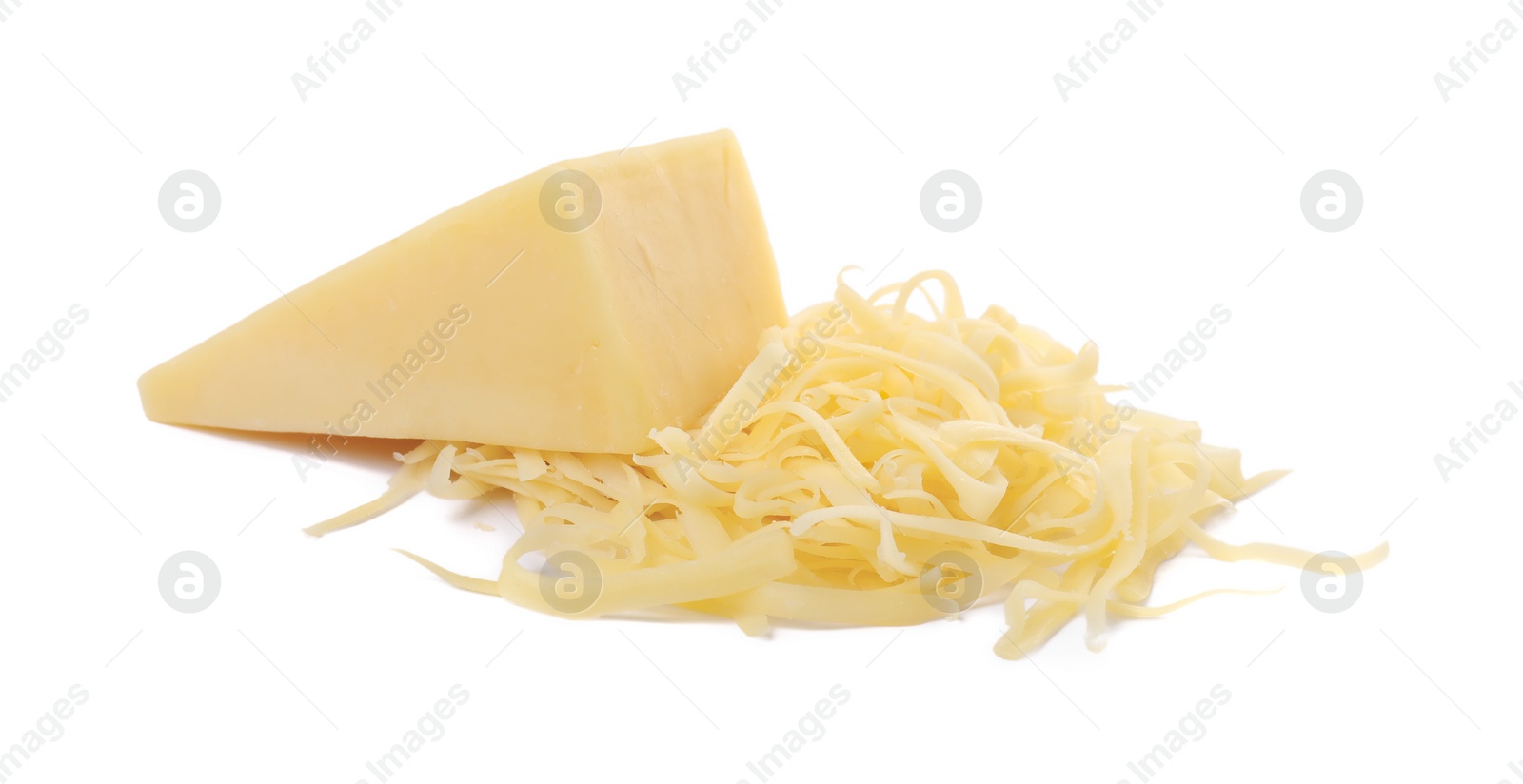 Photo of Grated and whole piece of cheese isolated on white