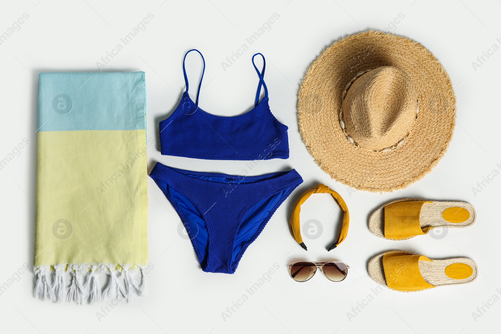 Photo of Composition with stylish beach accessories on white background, top view