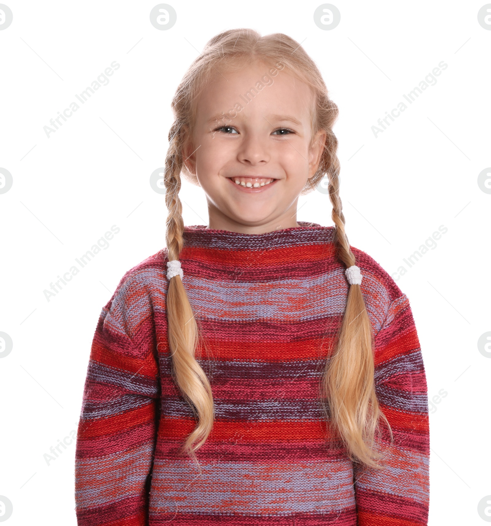 Photo of Cute little girl in warm sweater on white background. Winter season