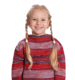 Cute little girl in warm sweater on white background. Winter season