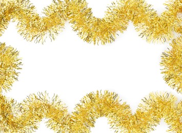 Image of Frame made of shiny golden tinsels on white background, top view. Space for text