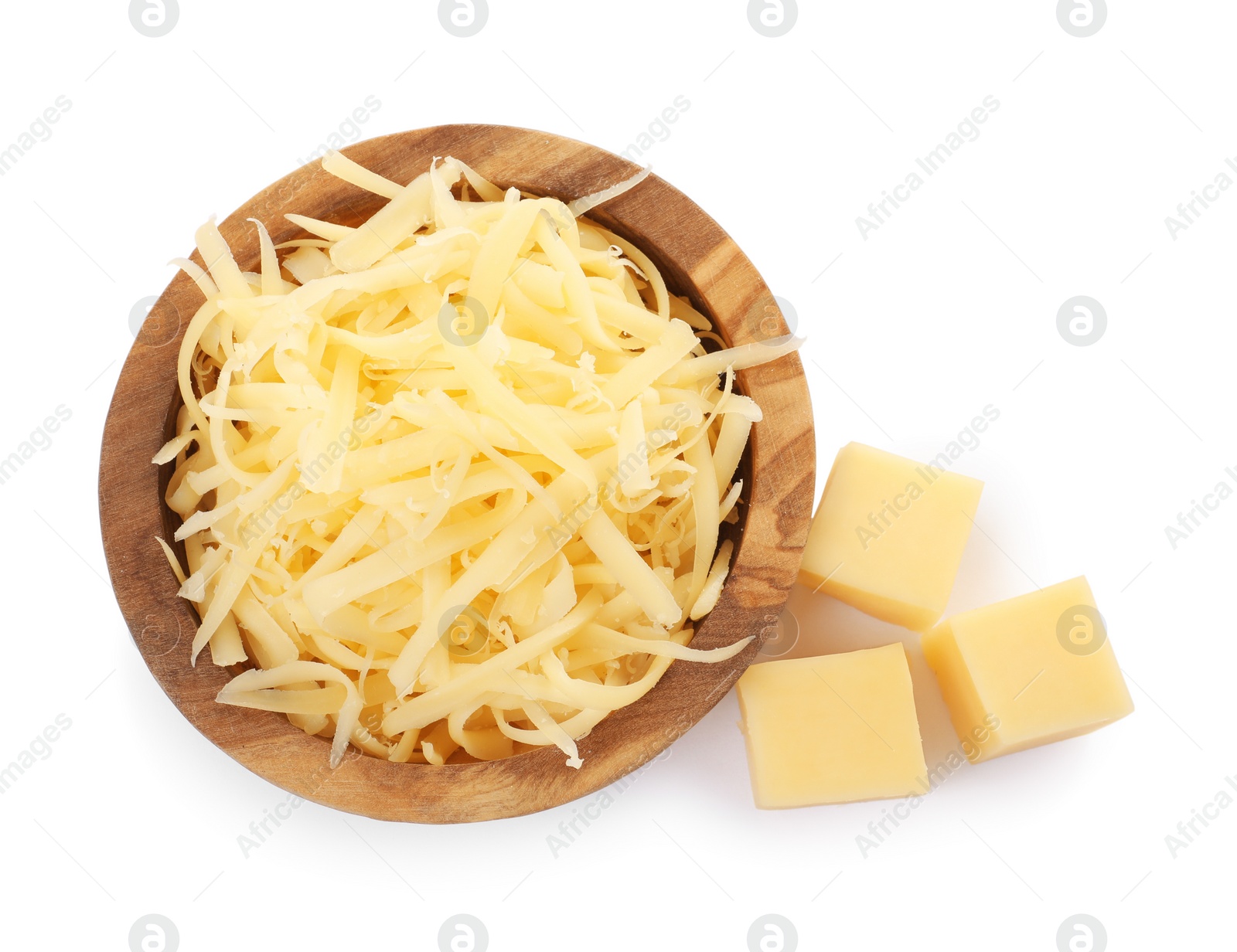Photo of Grated cheese in bowl and pieces of one isolated on white, top view