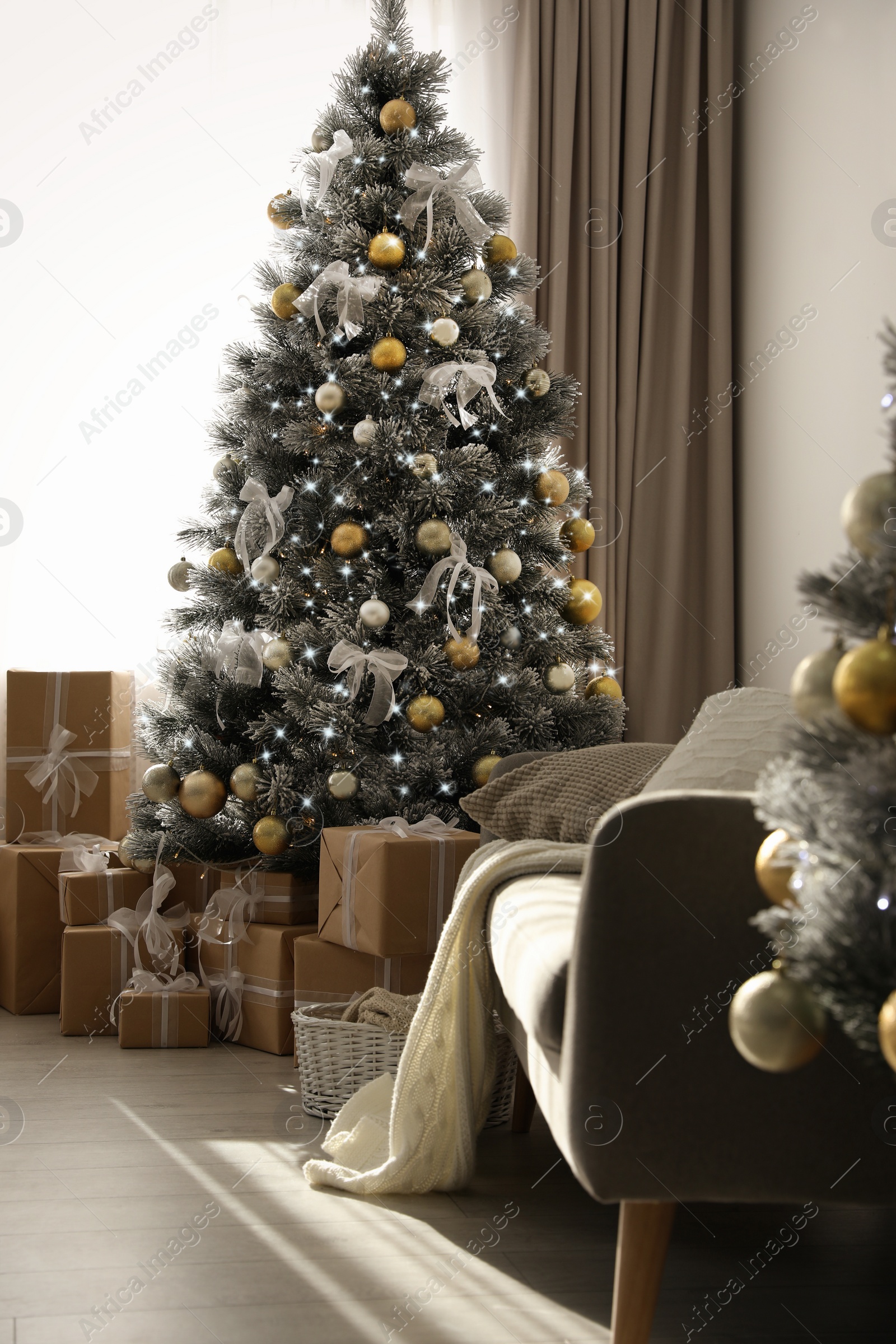 Photo of Stylish Christmas interior with beautiful decorated tree