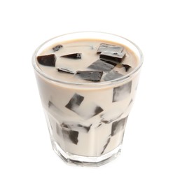 Photo of Glass of milk with grass jelly isolated on white