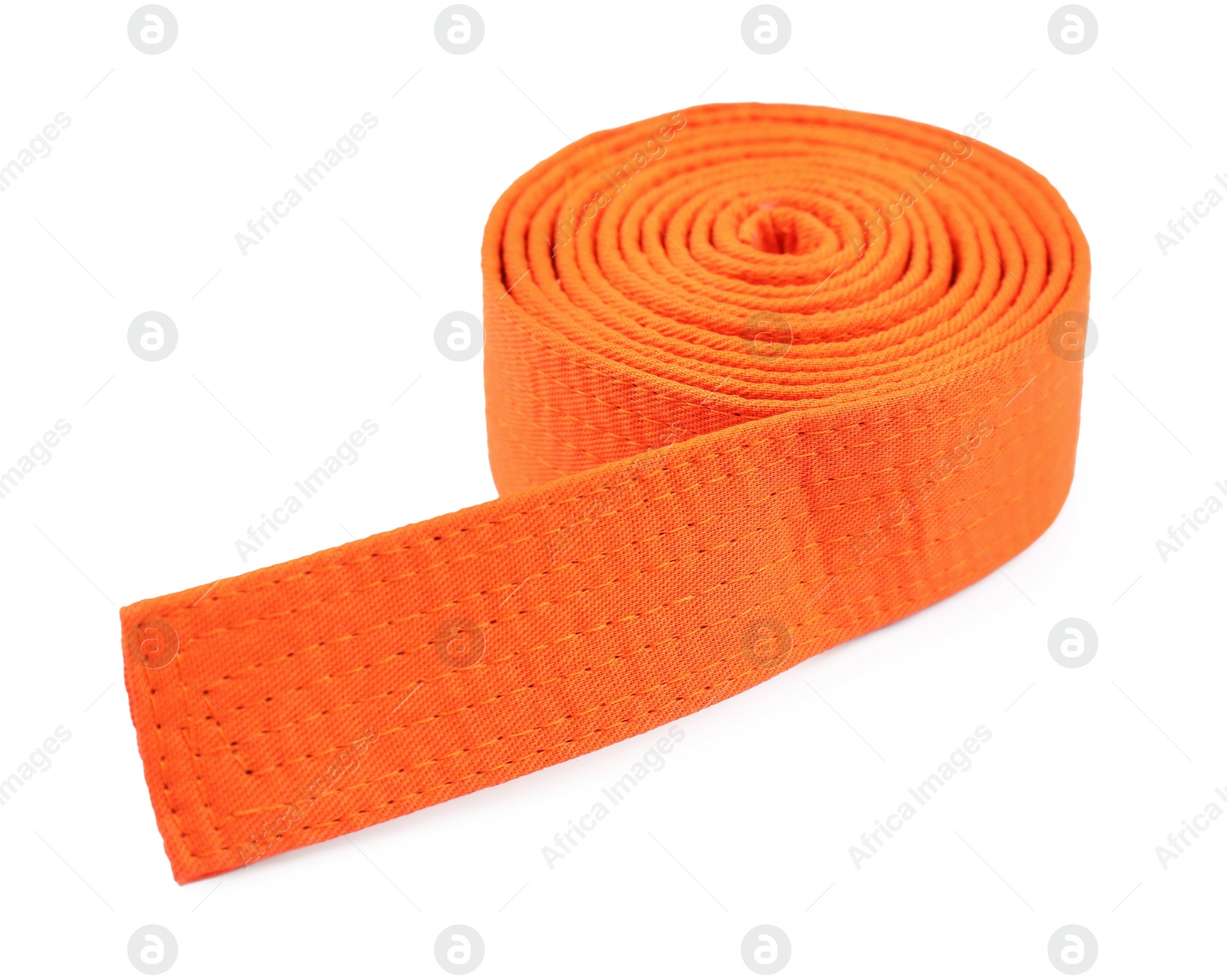 Photo of Orange karate belt isolated on white. Martial arts uniform