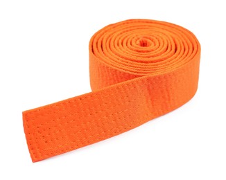 Photo of Orange karate belt isolated on white. Martial arts uniform
