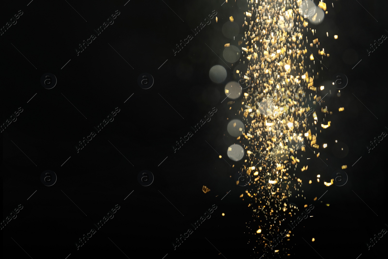 Photo of Blurred view of festive lights on black background, space for text. Bokeh effect