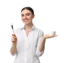 Photo of Cosmetologist with cosmetic product and brush on white background