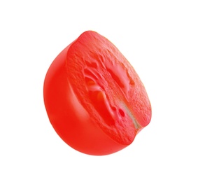 Photo of Cut red cherry tomato on white background