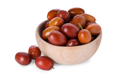 Photo of Ripe red dates in wooden bowl on white background