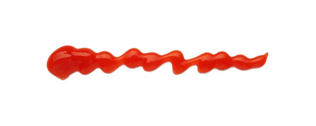 Photo of Tasty ketchup smear isolated on white, top view. Tomato sauce