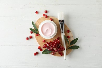 Photo of Flat lay composition with natural pomegranate facial mask on white wooden table