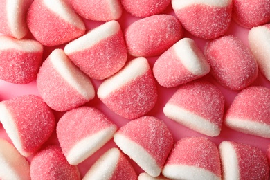 Photo of Sweet color jelly candies as background, top view