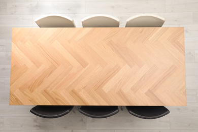 Photo of Modern office table with chairs, top view