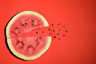 Photo of Flat lay composition with watermelon slices on red background