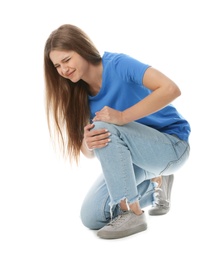 Photo of Full length portrait of woman having knee problems on white background