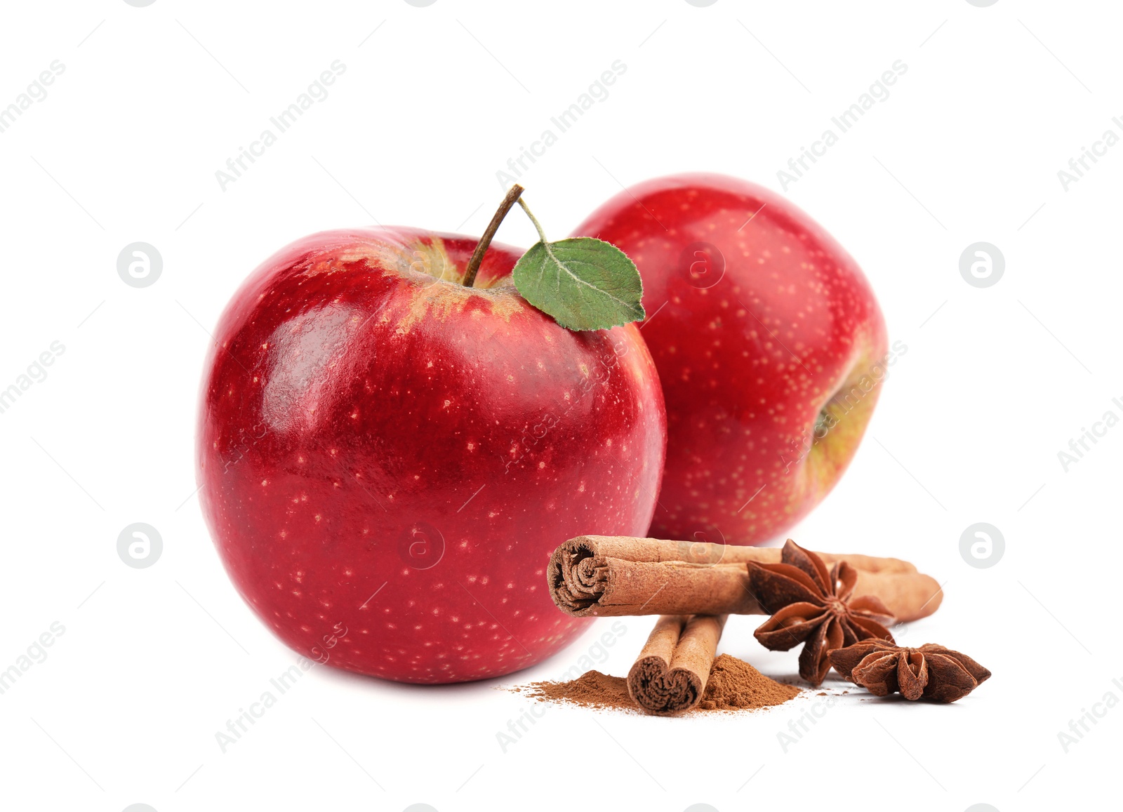 Image of Aromatic cinnamon sticks, anise stars and red apples isolated on white