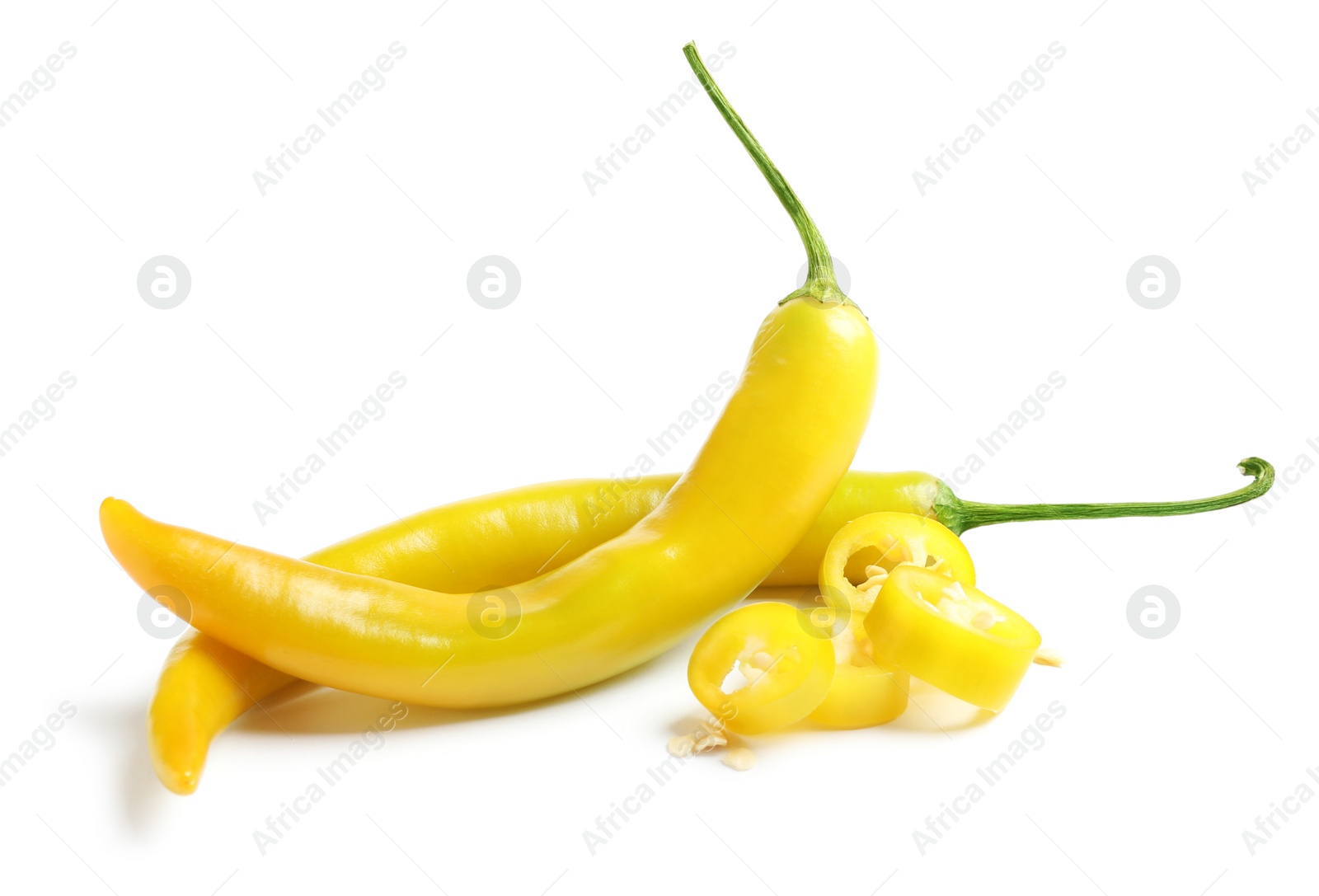 Photo of Ripe yellow hot chili peppers isolated on white