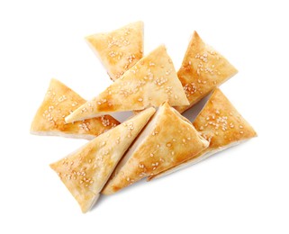Photo of Delicious fresh puff pastries isolated on white, top view