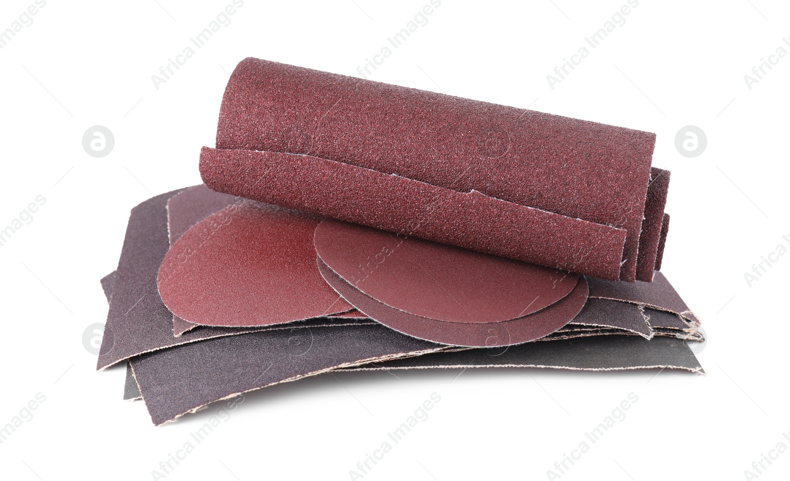 Photo of Many sheets of sandpaper isolated on white