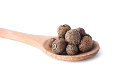 Photo of Spicy black pepper grains isolated on white