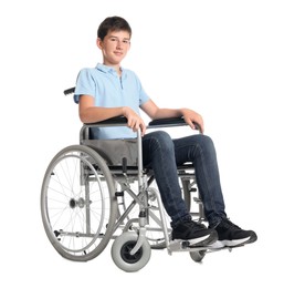 Teenage boy in wheelchair on white background