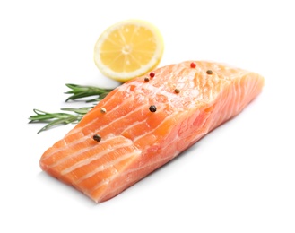 Photo of Fresh salmon with rosemary and lemon on white background