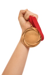 Photo of Woman holding bronze medal on white background, closeup