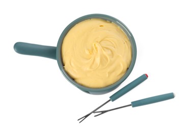 Photo of Fondue with tasty melted cheese and forks isolated on white, top view