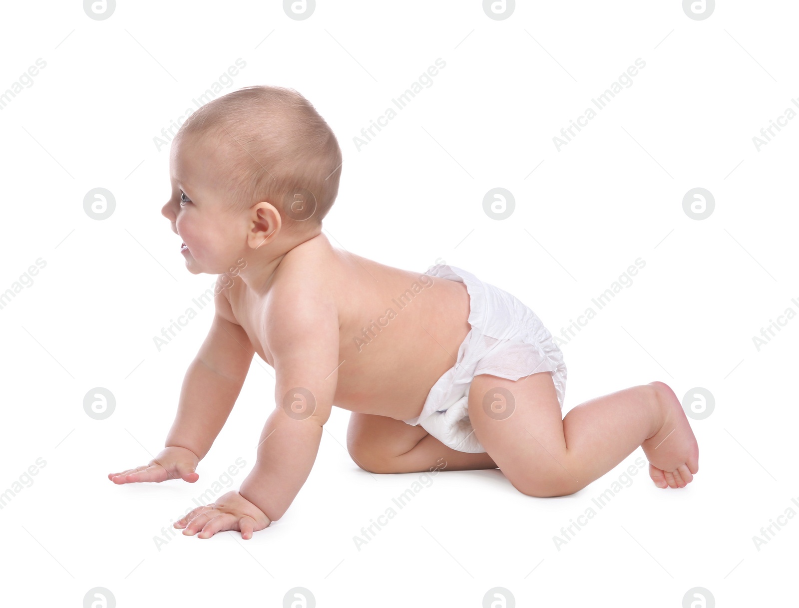 Photo of Cute baby in dry soft diaper crawling on white background