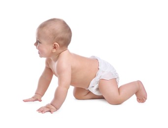 Cute baby in dry soft diaper crawling on white background