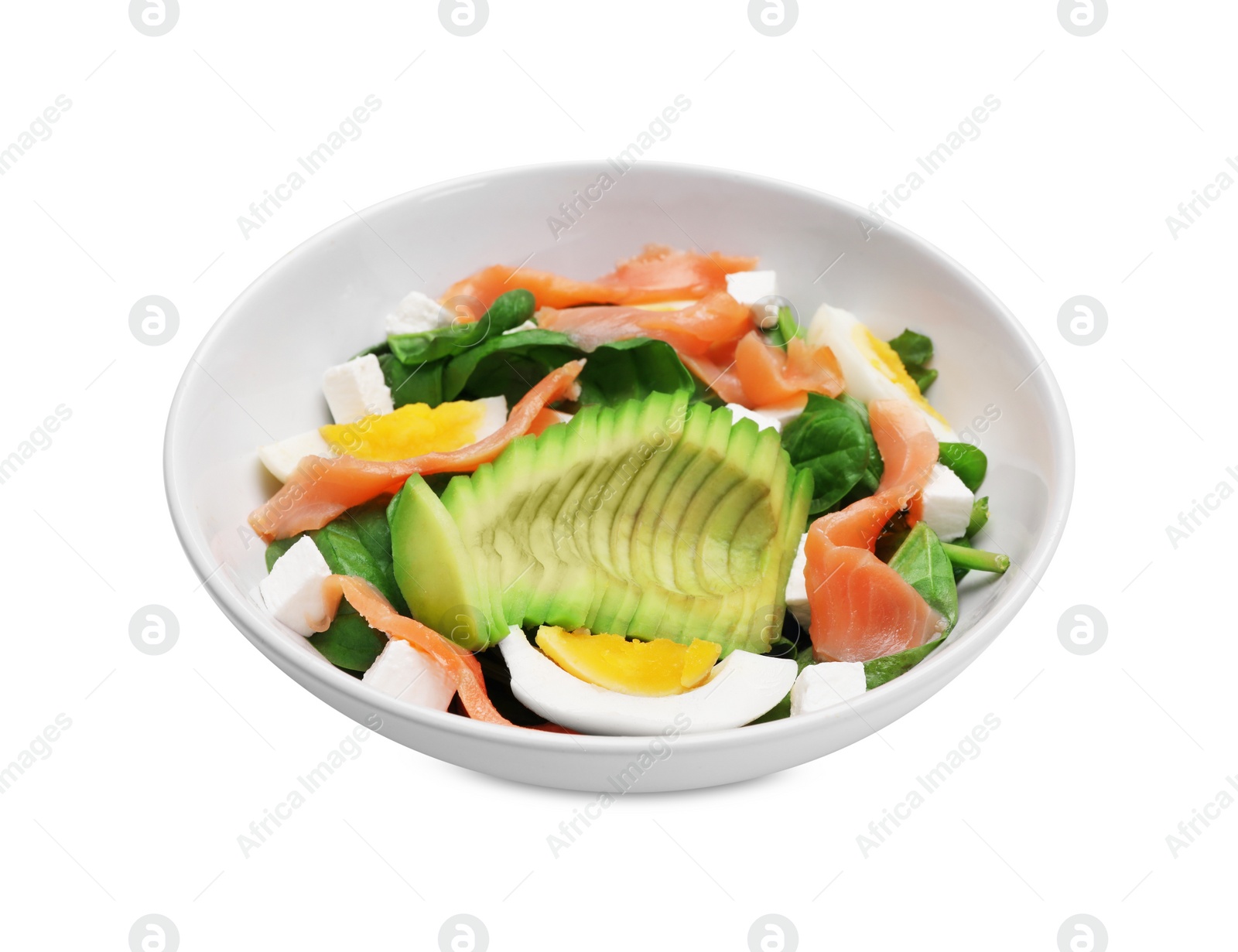 Photo of Delicious salad with boiled egg, salmon and avocado in bowl isolated on white