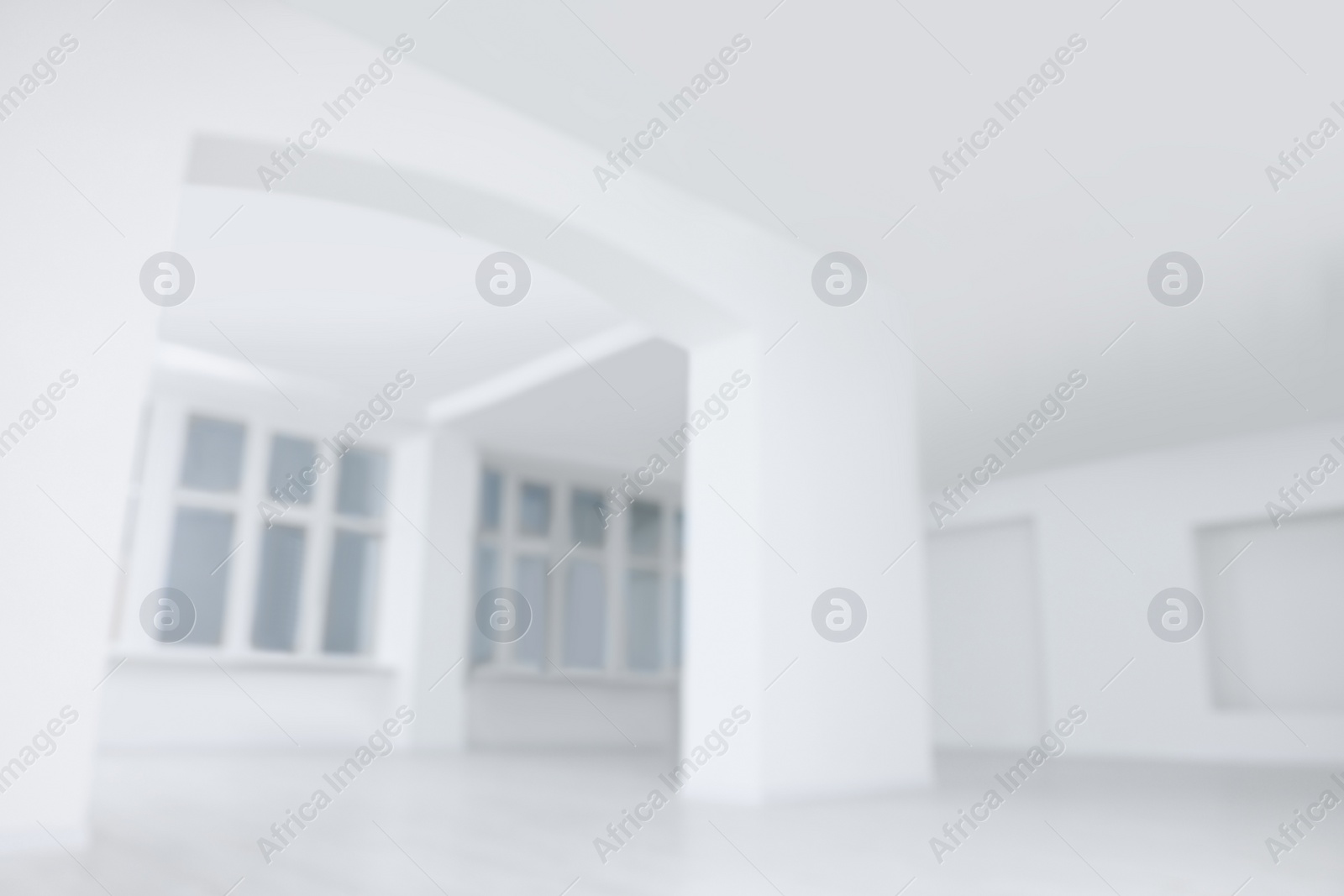 Photo of Blurred view of spacious room with windows during repair