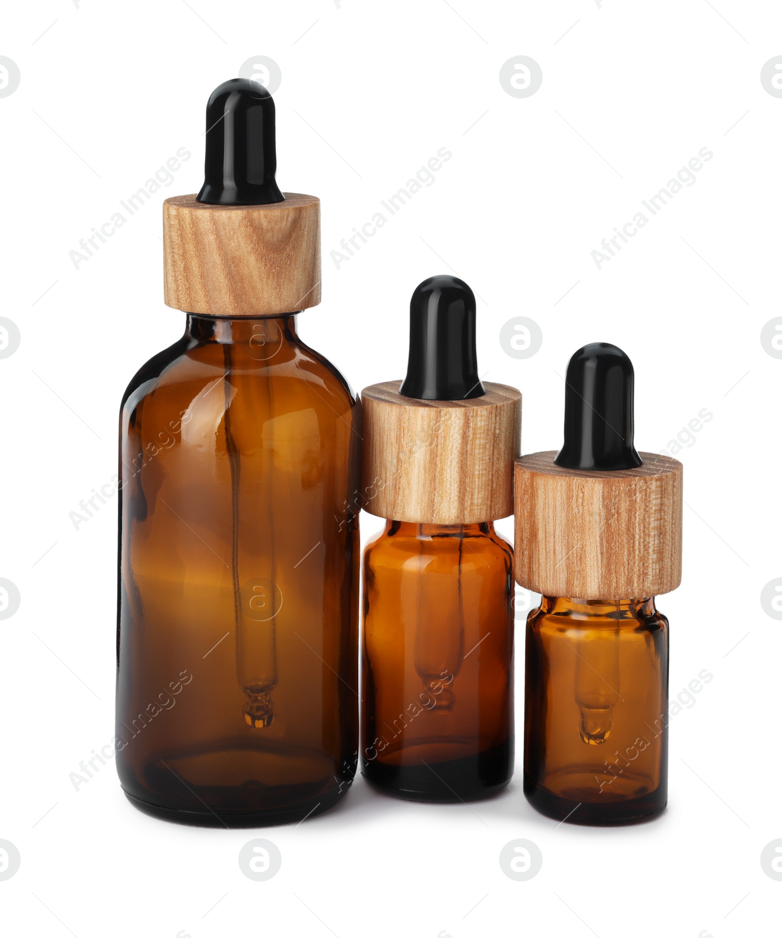Photo of New empty glass bottles with droppers isolated on white