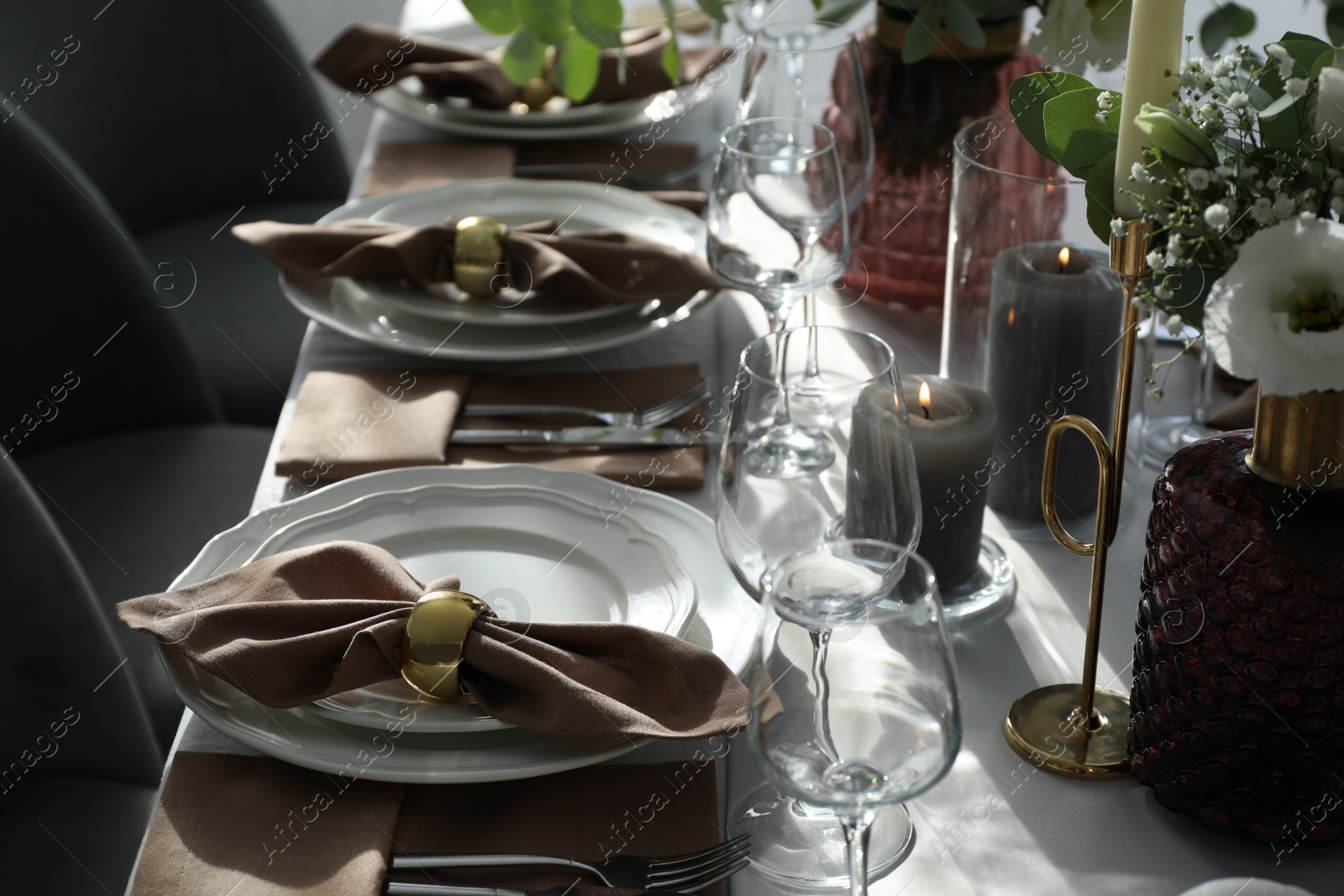 Photo of Festive table setting with beautiful decor indoors