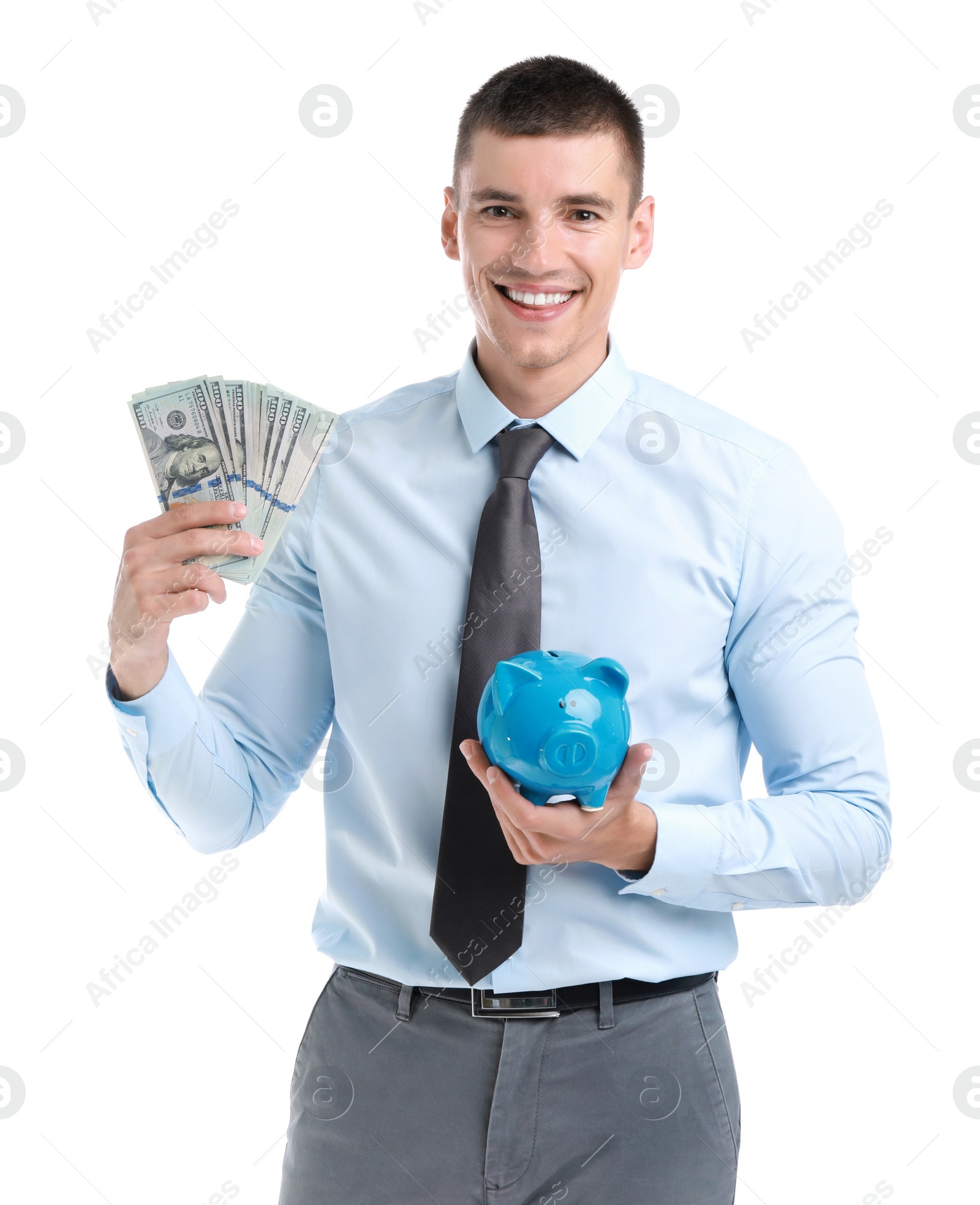 Photo of Handsome businessman with dollars and piggy bank on white background