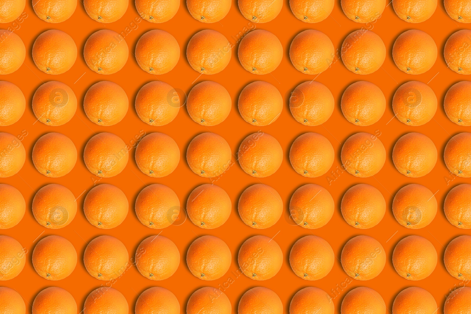 Image of Tasty fresh ripe oranges on orange background, flat lay