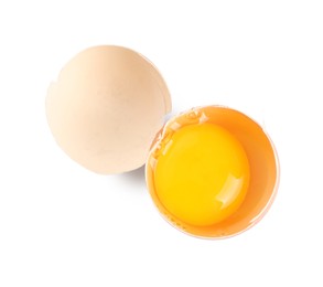 Cracked chicken egg with yolk isolated on white, top view