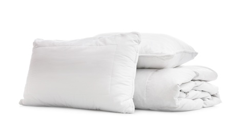 Soft blanket with pillows on white background