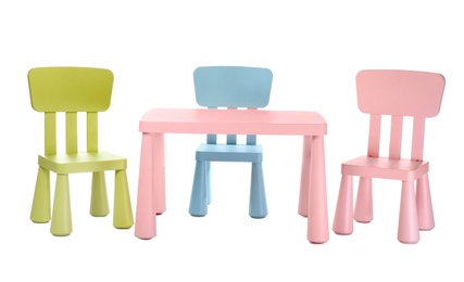 Photo of Colorful table and chairs for little kids isolated on white