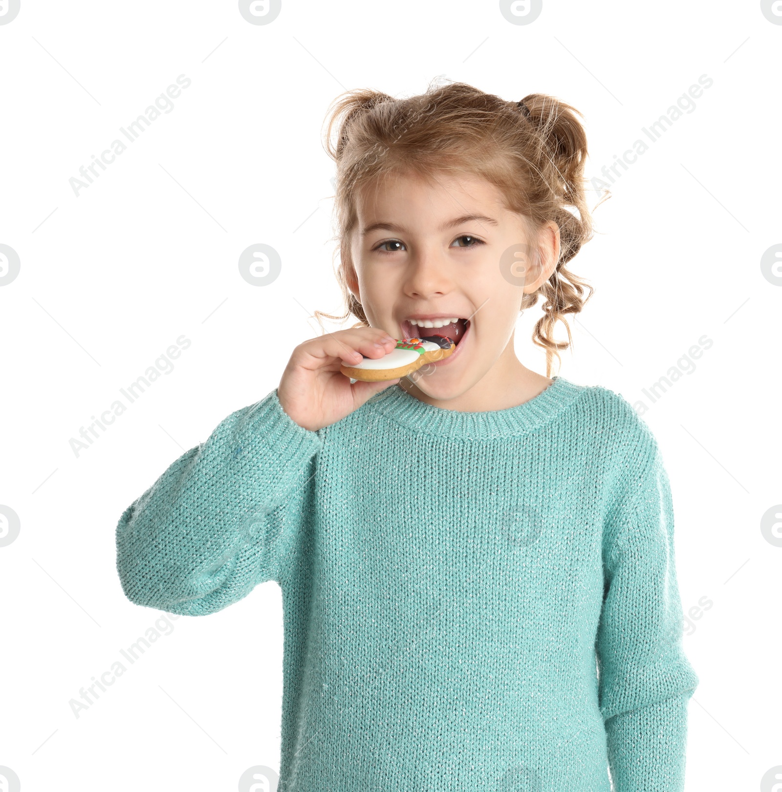 Photo of Cute little girl with Christmas gingerbread cookie on white background