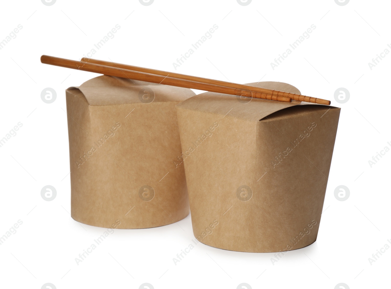 Photo of Cardboard food boxes with chopsticks isolated on white