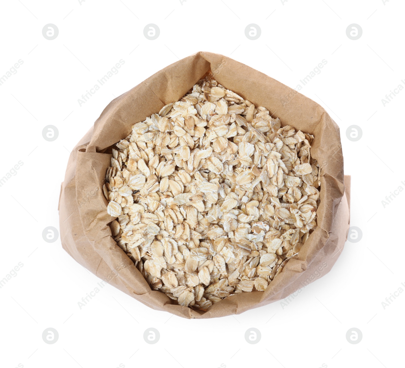 Photo of Raw oatmeal in paper bag isolated on white, top view