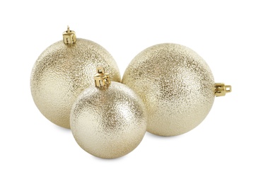 Photo of Beautiful shiny Christmas balls on white background