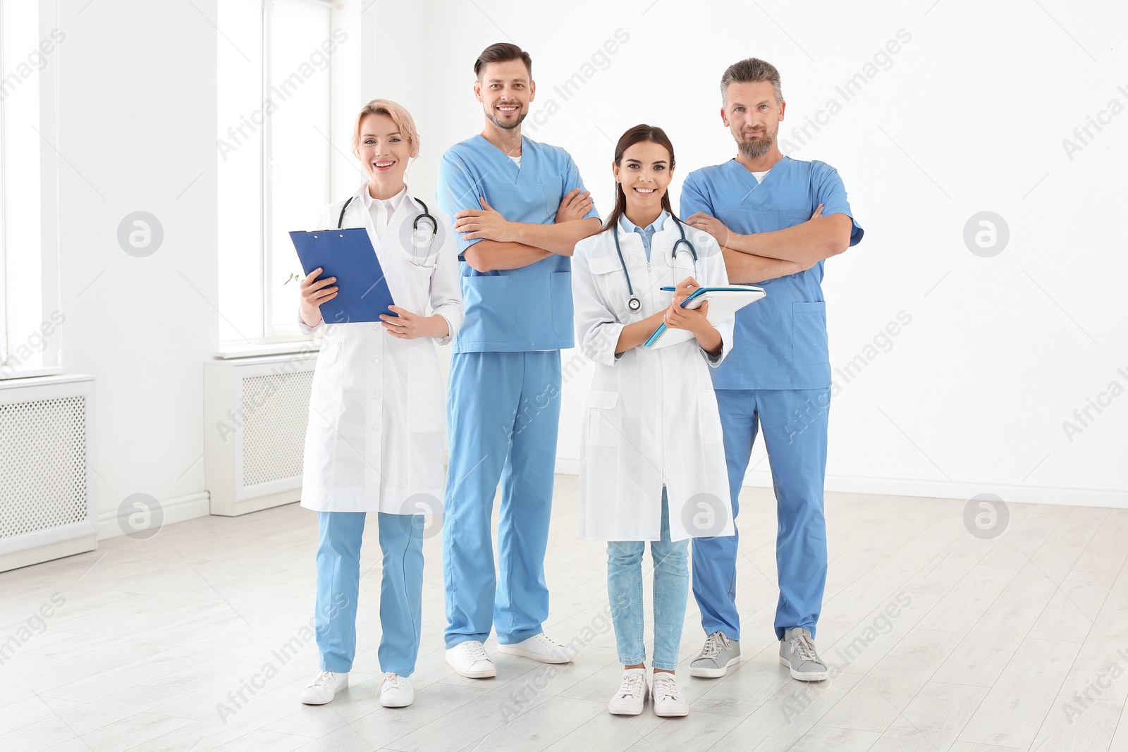 Photo of Doctors and medical assistants in clinic. Health care service