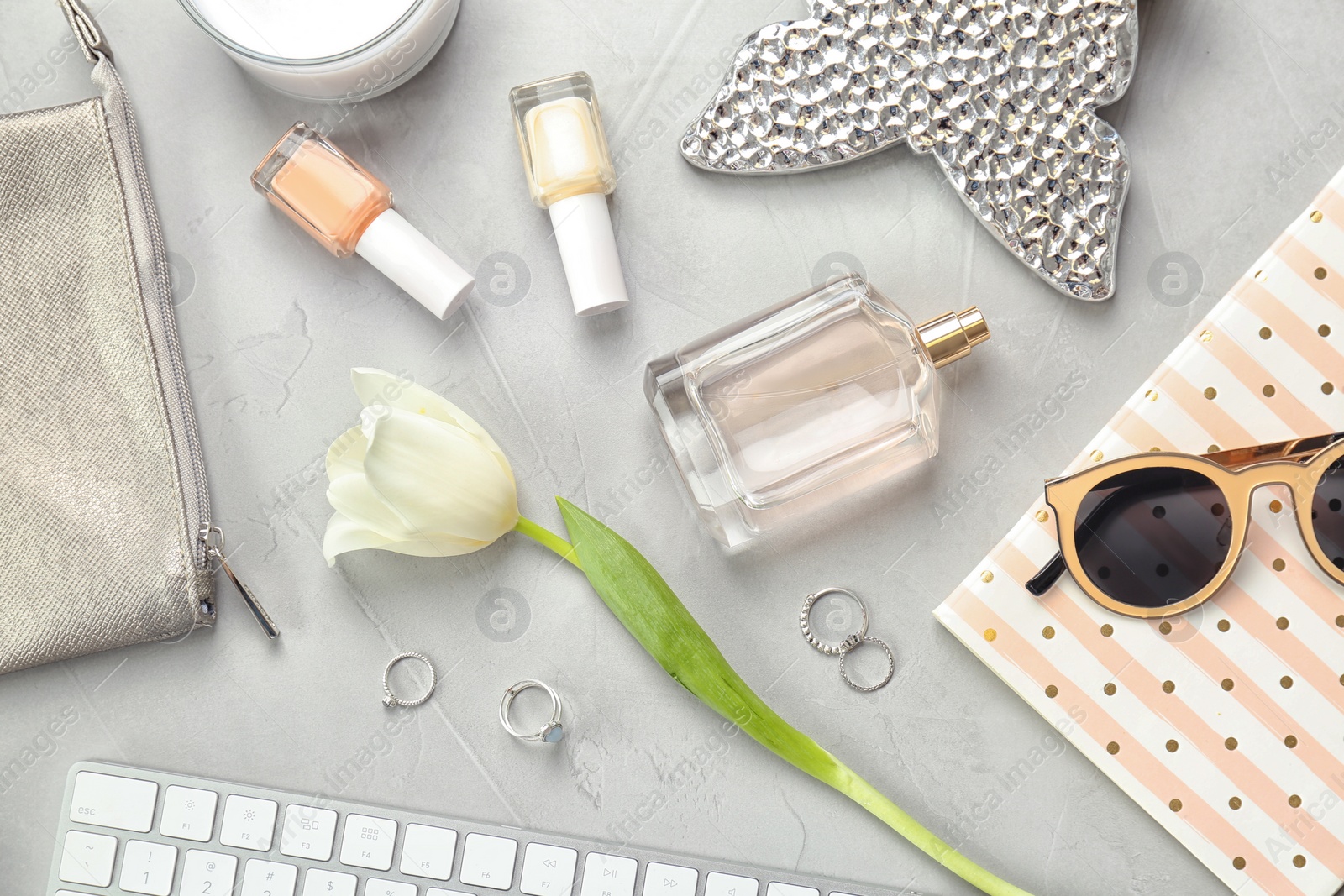 Photo of Flat lay composition with cosmetics and stylish accessories on light background