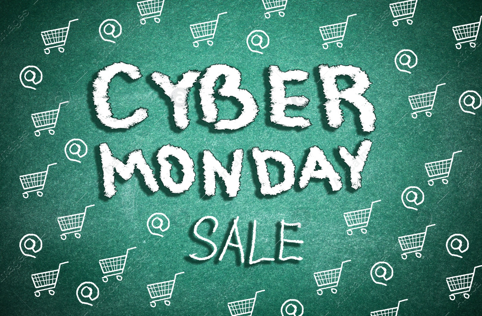 Illustration of  Text Cyber Monday Sale and pictures of small shopping carts on green chalkboard