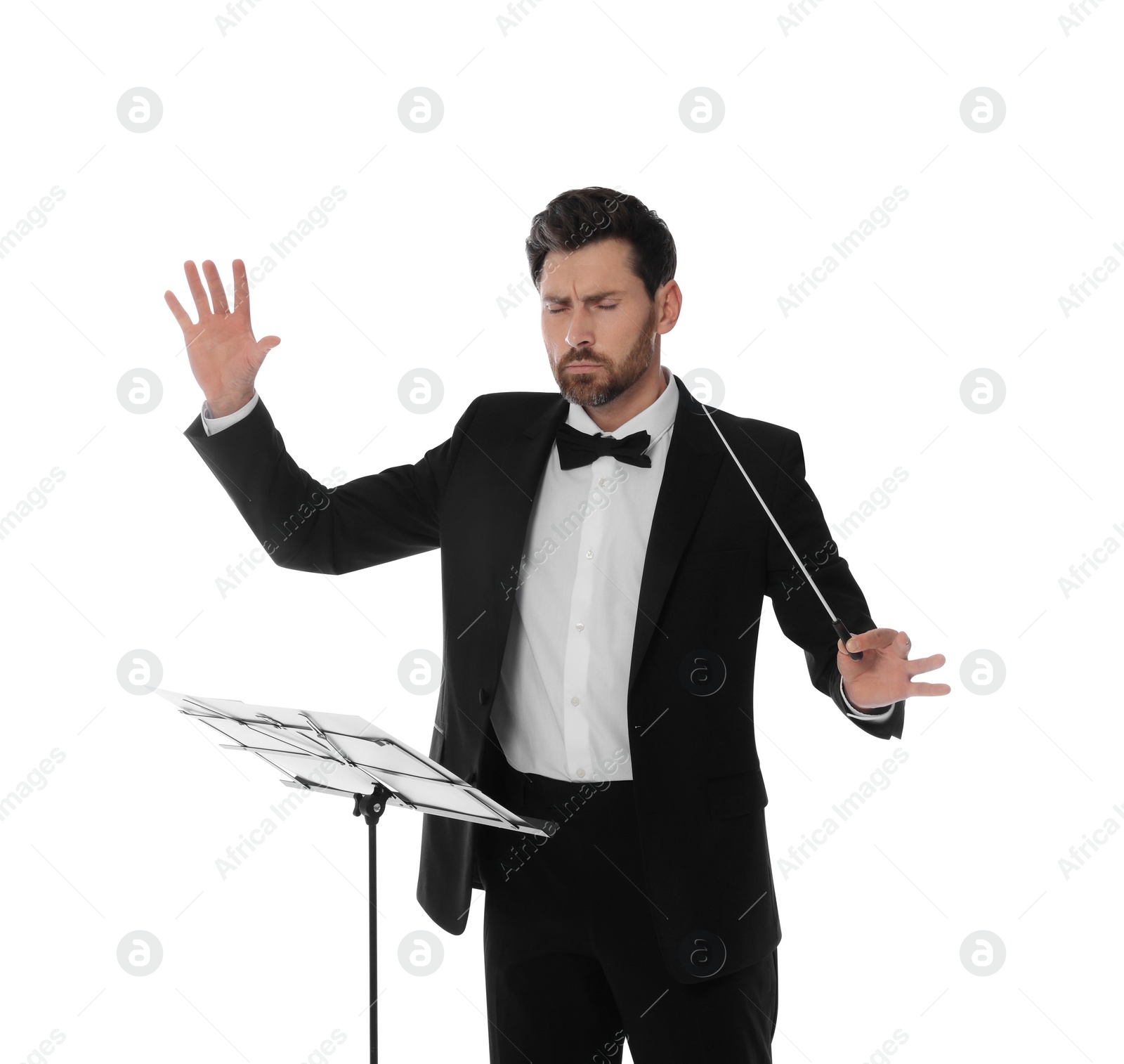 Photo of Professional conductor with baton and note stand on white background