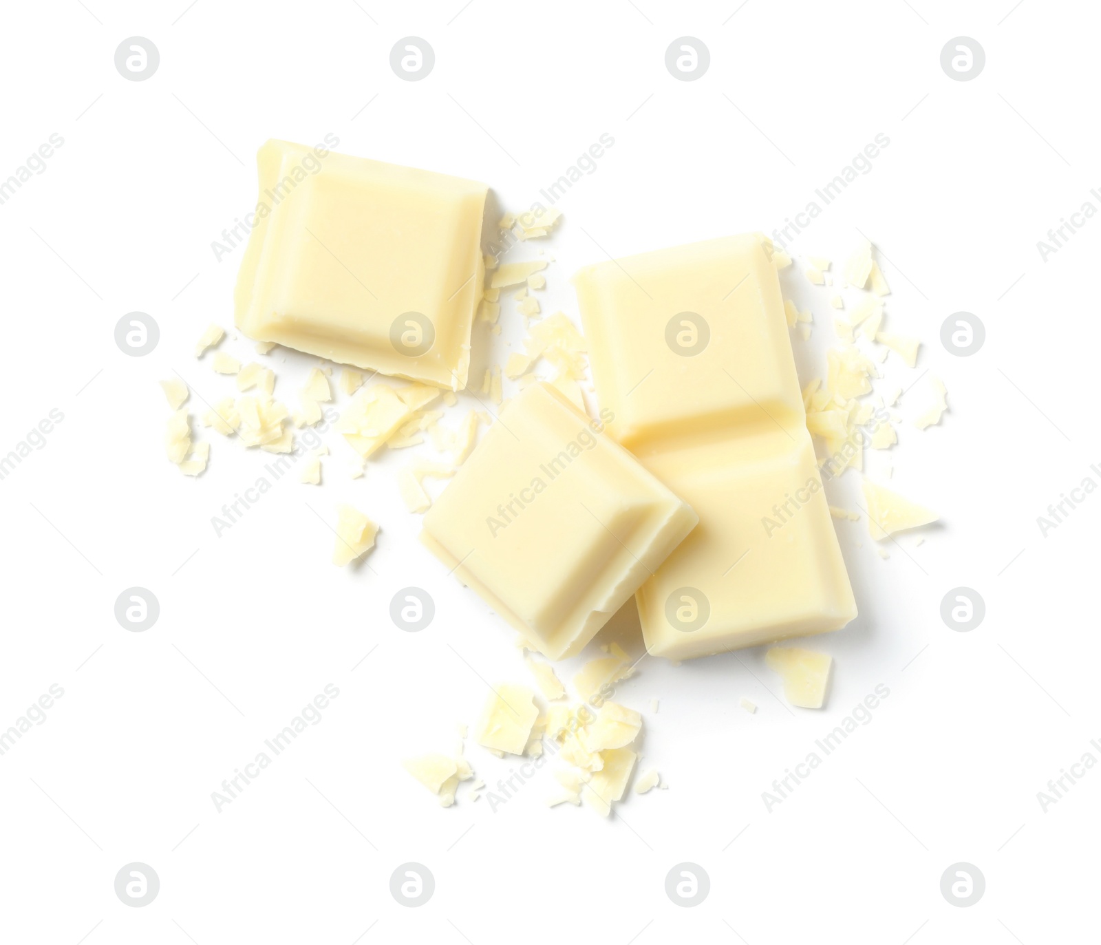 Photo of Pieces of delicious chocolate isolated on white, top view