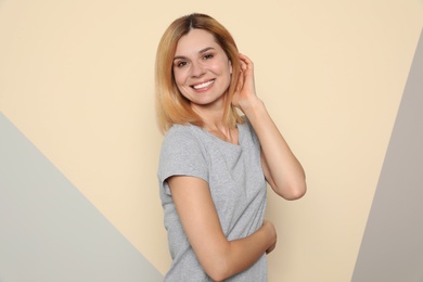 Photo of Portrait of woman with beautiful face on color background